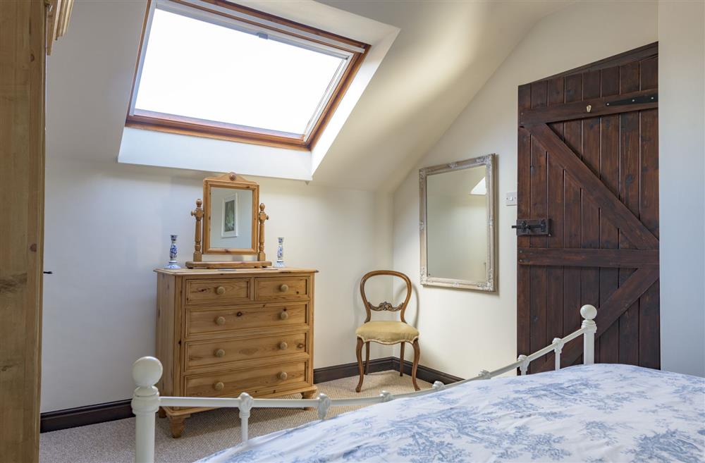 The Master bedroom is complimented with vintage furnishings at The Old Potting Shed, Kirkbymoorside, York, North Yorkshire