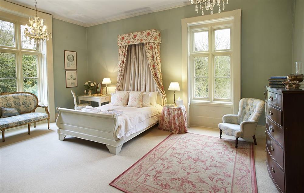 Double bedroom with 5’ canopied bed at The Old Rectory and Coach House, North Tuddenham