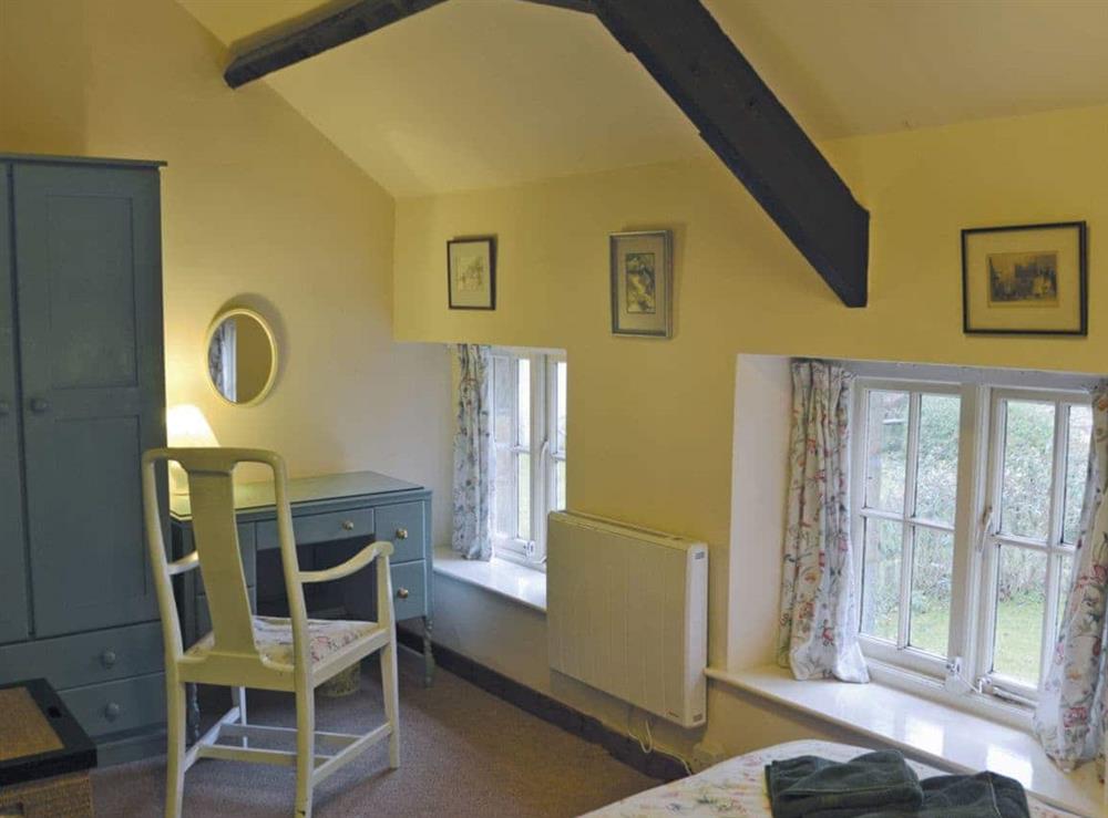 Charming double bedroom with beams (photo 2) at Stable Cottage, 