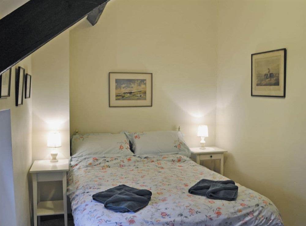 Charming double bedroom with beams at Stable Cottage, 