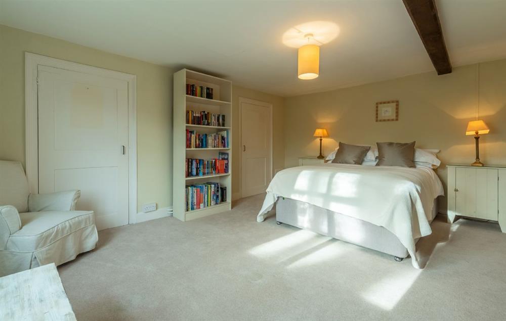 First floor: Bedroom three with  king-size bed at The Old Rectory, Heveningham