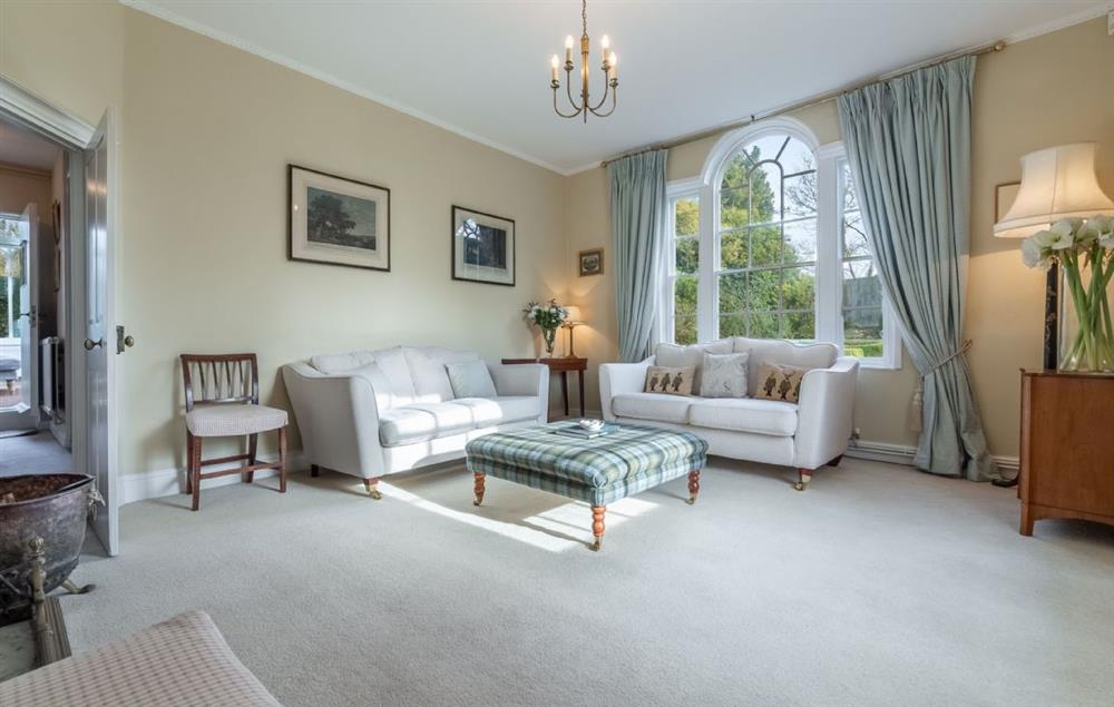 Ground floor: Sitting room with open fireplace  at The Old Rectory, Heveningham