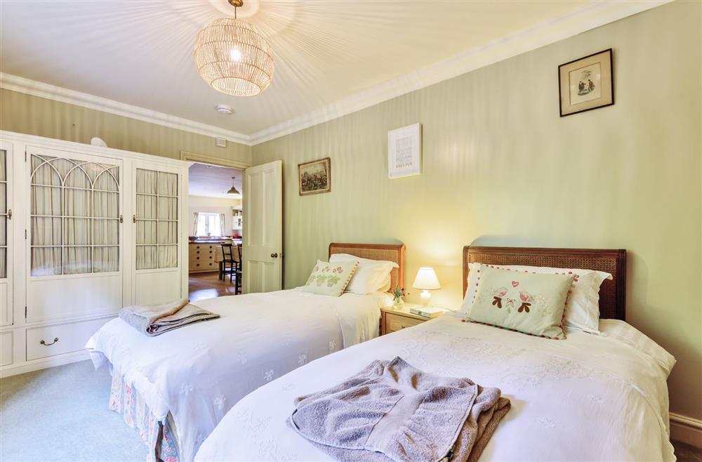 Bedroom two with twin single beds at The Old Rectory Lodge, Dorchester