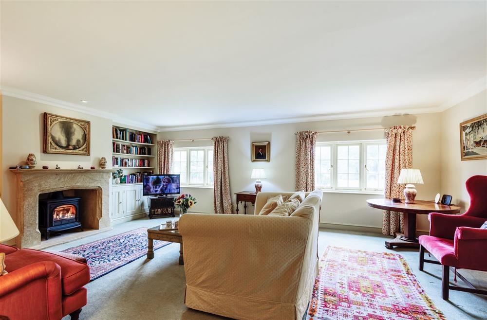 The sitting room with television at The Old Rectory Lodge, Dorchester