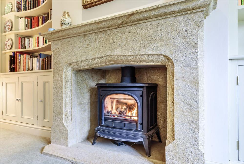 The stone fireplace and feature gas fire at The Old Rectory Lodge, Dorchester