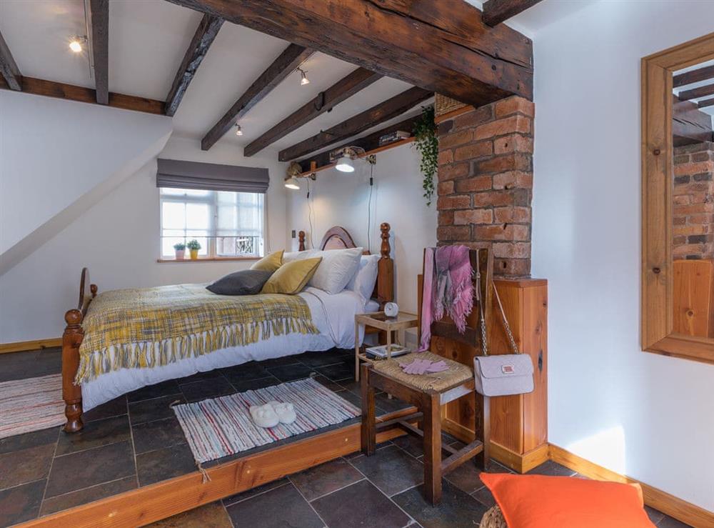 Double bedroom with wood beams at The Old Rope Works in Bewdley, Worcestershire