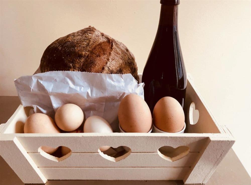 Welcome pack comprising home made Artisan bread and craft beer and local eggs