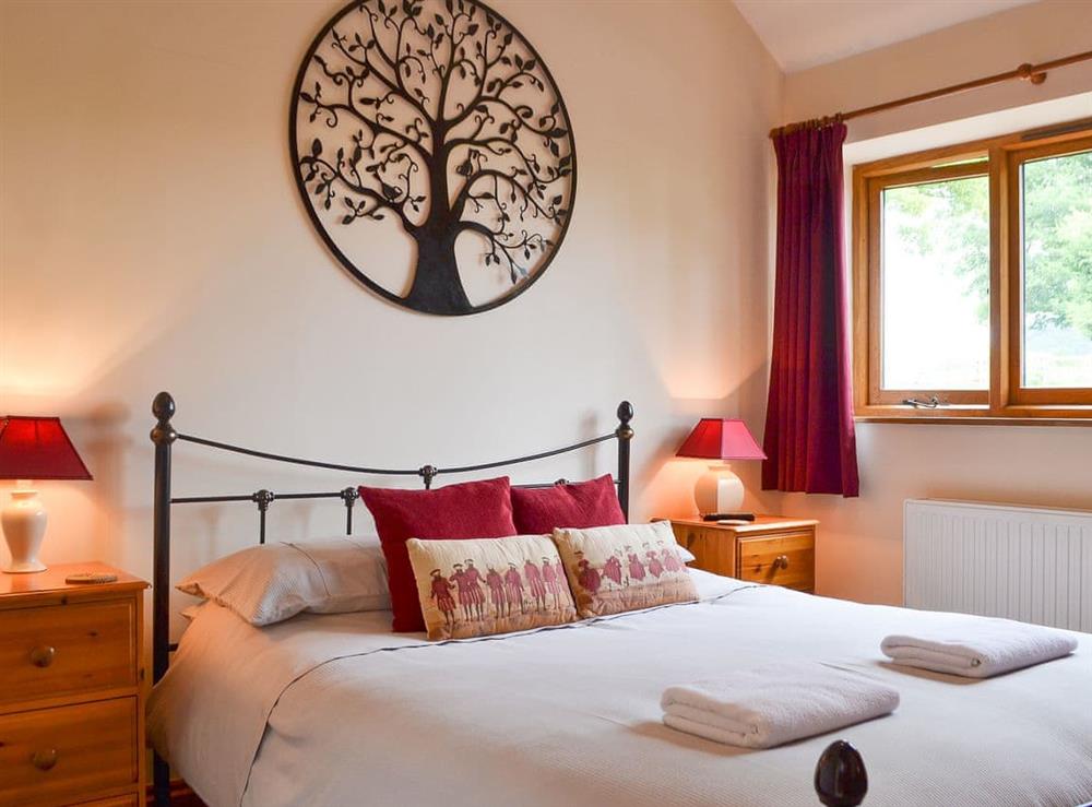 Inviting double bedroom at The Old Sawmill in Bucknell, Shropshire