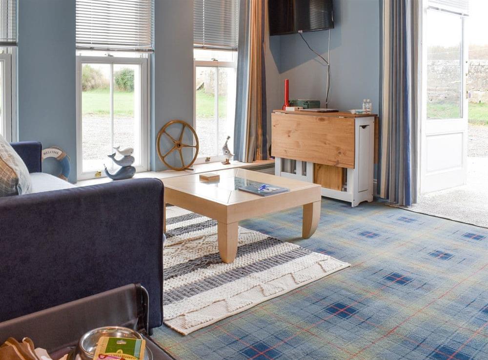 Light and airy living space at The Old School House Apartment in Tain, Ross-Shire