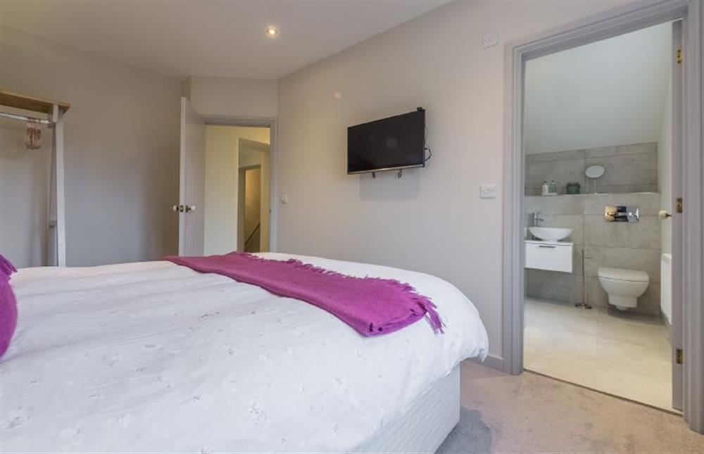 First floor: Master bedroom has en-suite shower room at The Old School House, Docking near Kings Lynn