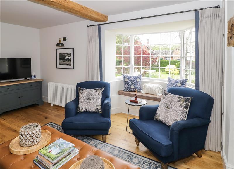 Relax in the living area at The Old School House, Dumbleton near Alderton