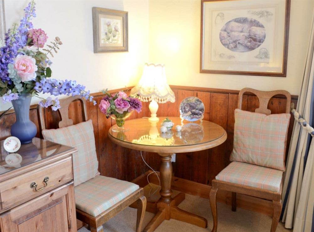 Charming dining area in the living room at The Old School House in Lonbain, by Applecross, Wester Ross., Ross-Shire