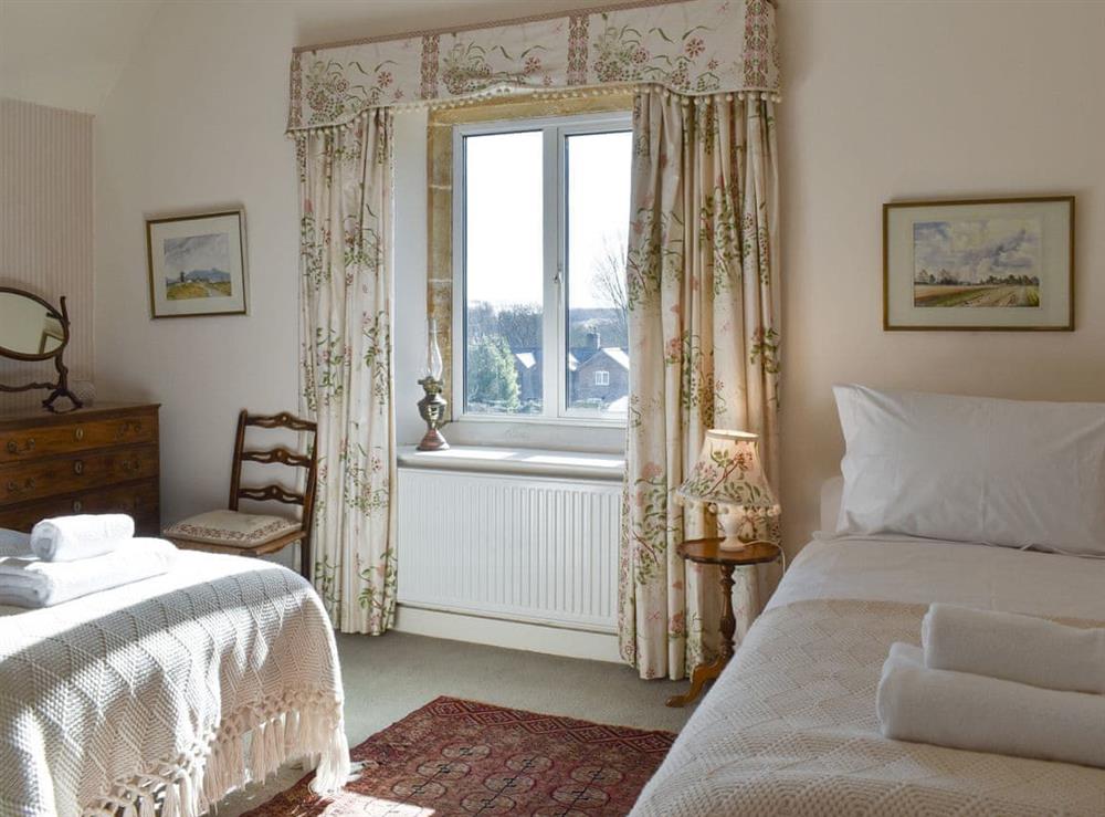 Comfortable twin bedroom at The Old School House in Lower Bockhampton, near Dorchester, Dorset