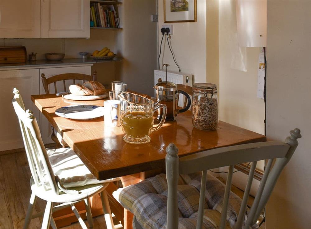 Convenient dining area within kitchen at The Old School House in Lower Bockhampton, near Dorchester, Dorset