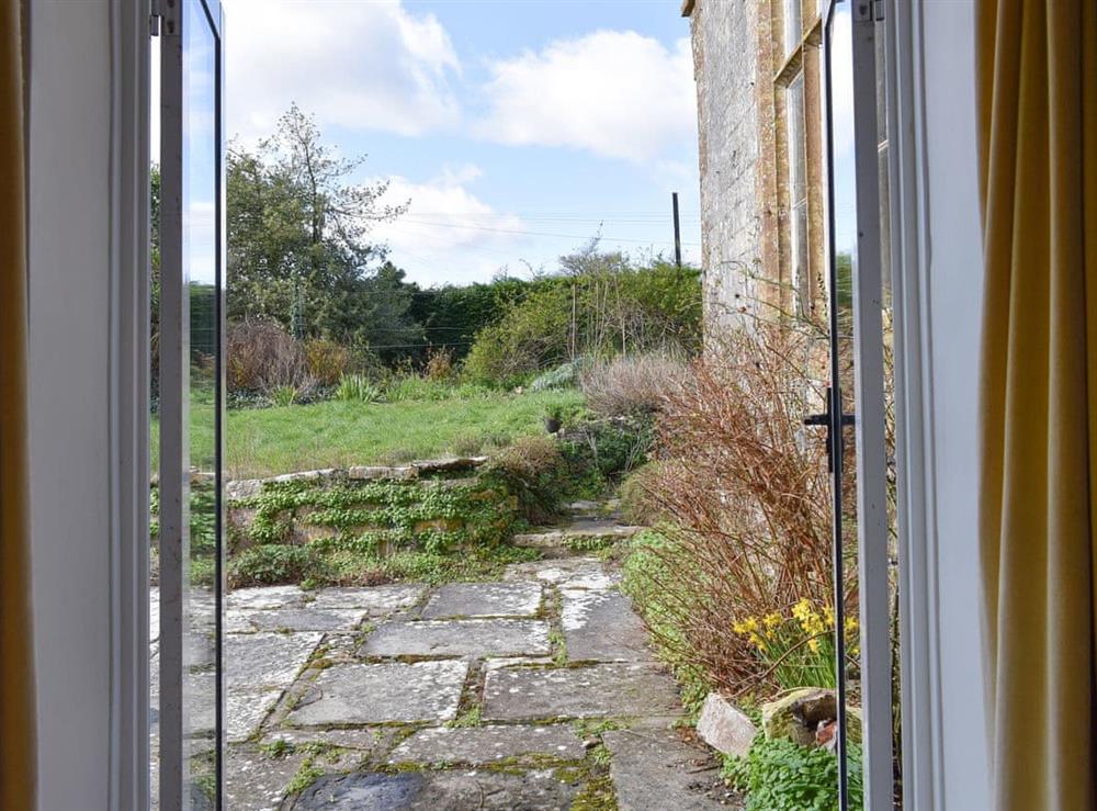 Patio doors from the living room to the garden at The Old School House in Lower Bockhampton, near Dorchester, Dorset