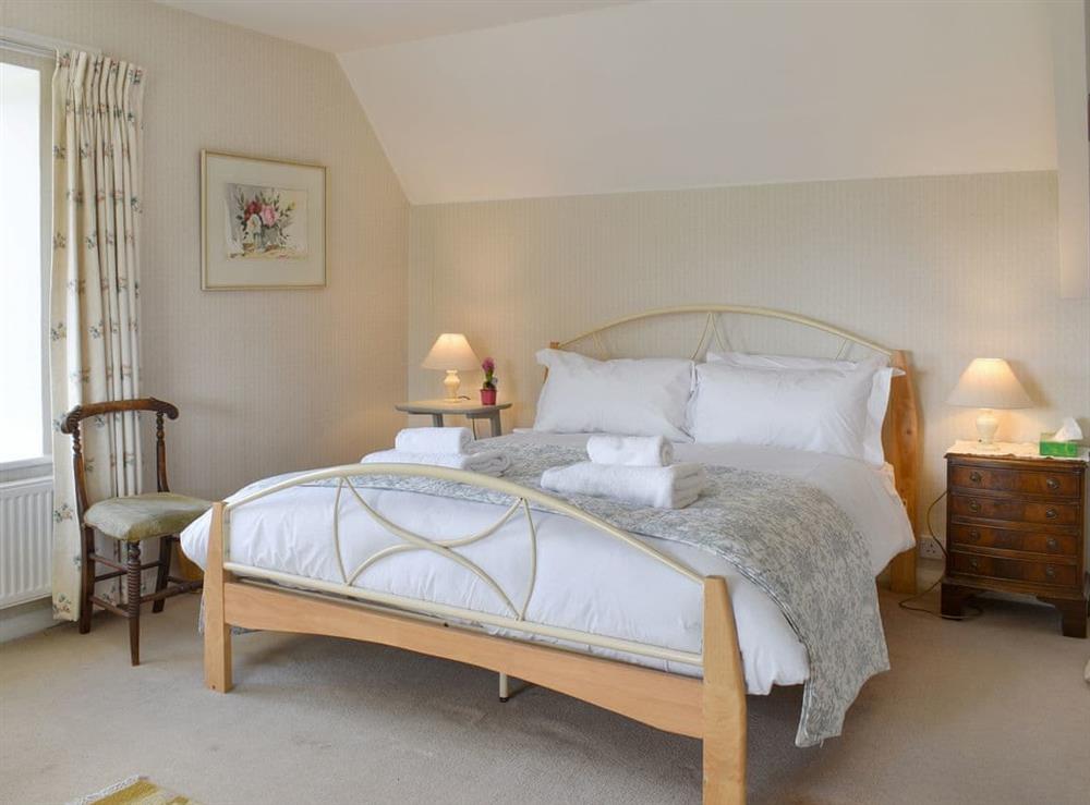 Peaceful master bedroom at The Old School House in Lower Bockhampton, near Dorchester, Dorset