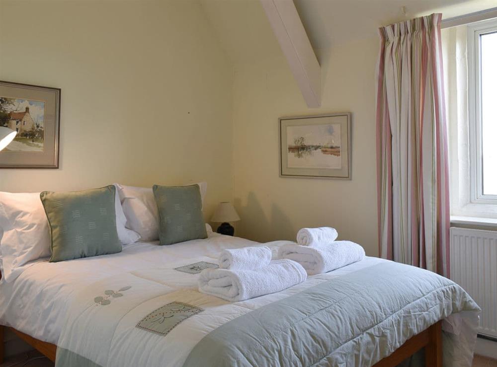 Relaxing double bedroom at The Old School House in Lower Bockhampton, near Dorchester, Dorset