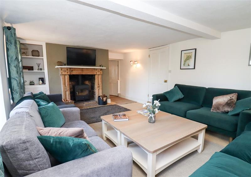 Relax in the living area at The Old School House, Lower Swell near Stow-On-The-Wold