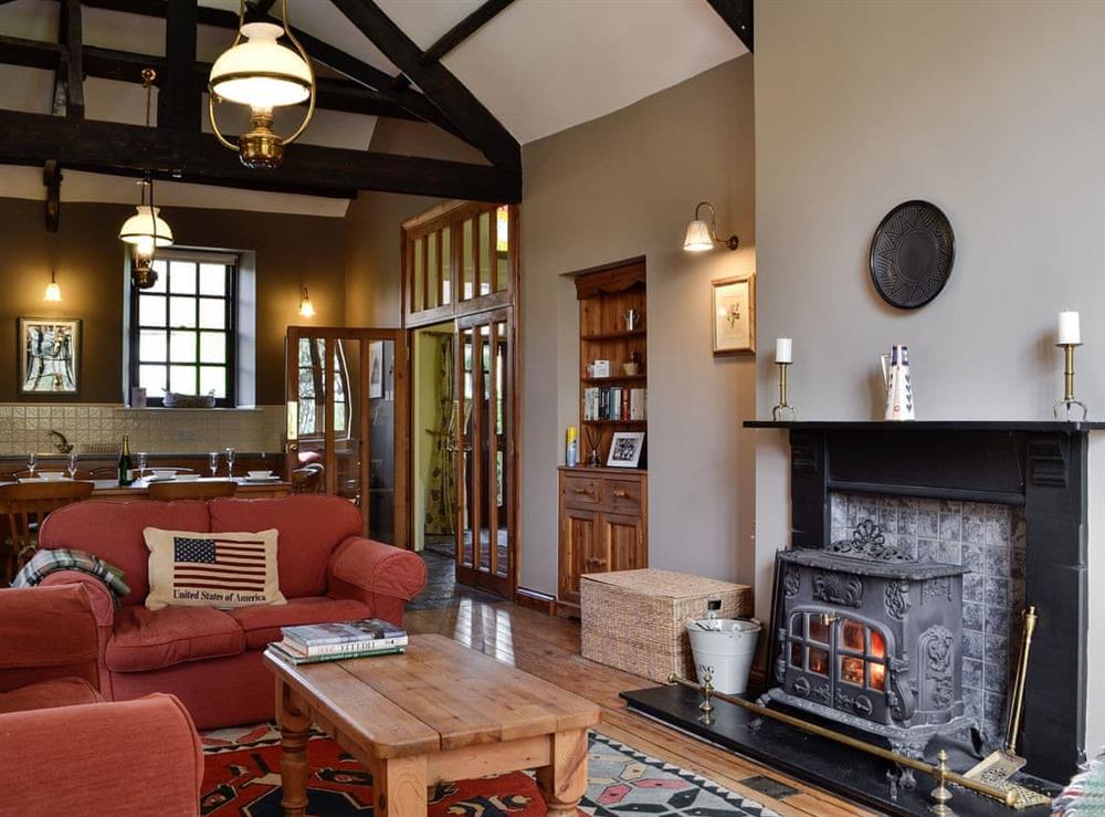 Open plan living space with wood beams at The Old School Penallt in Penallt, near Monmouth, Gwent
