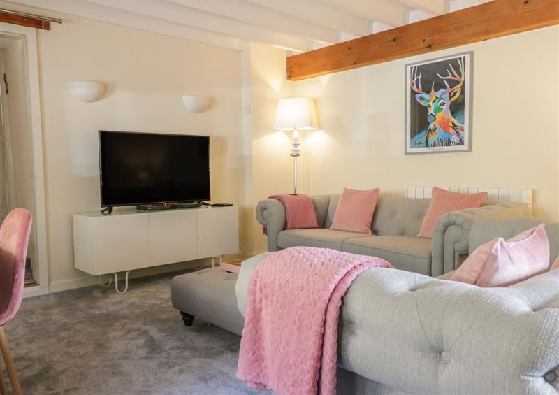 Relax in the living area at The Old Smithy Cottage, Maentwrog near Penrhyndeudraeth