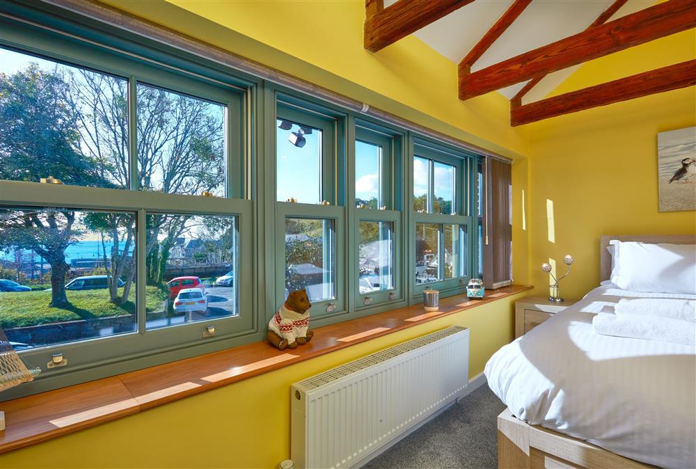 First floor: Master bedroom with 5ft king-size bed and views towards the sea  at The Old Smoke House, St Austell