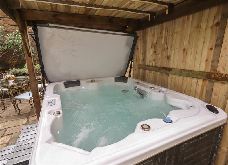 Enjoy the hot tub at The Old Sorting Office, Hawarden