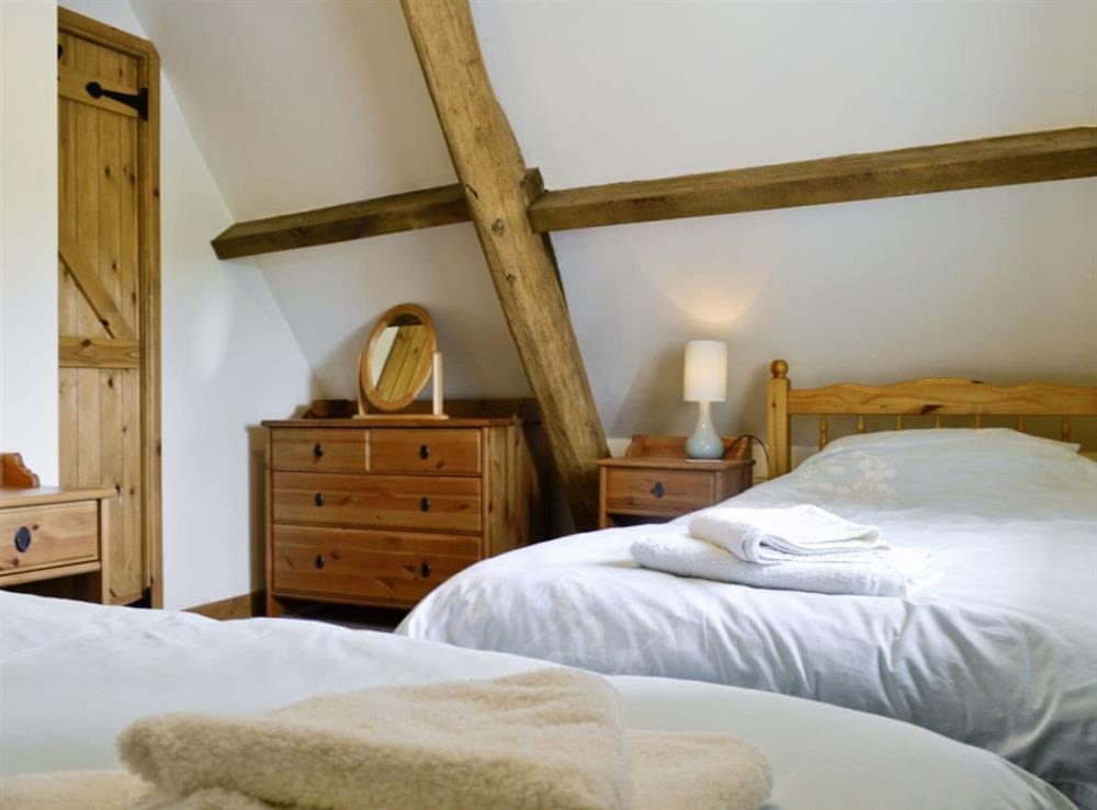 Twin bedroom at The Old Stables in Malmesbury, Wiltshire