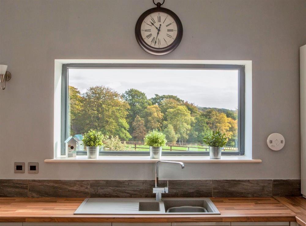View through kitchen window to surrounding countryside at Number 3, 