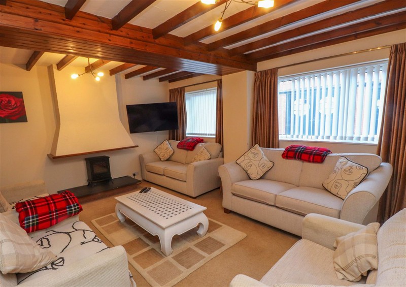 Relax in the living area at The Old Stables, Rhos-On-Sea