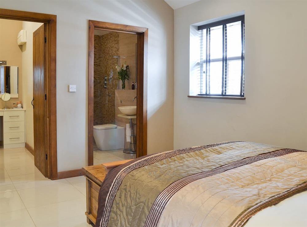 Double bedroom with en-suite and dressing area at The Old Stables in South Cave, near Beverley, Yorkshire, North Humberside