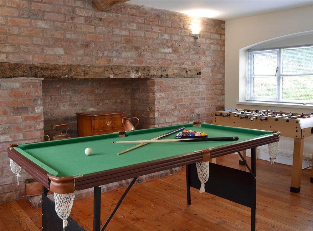 Games room with snooker and table football at The Old Stables in Standon, Staffordshire