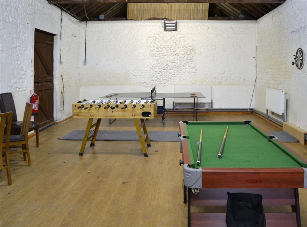 Shared indoor games room at The Old Stables in Swafield, near North Walsham, Norfolk