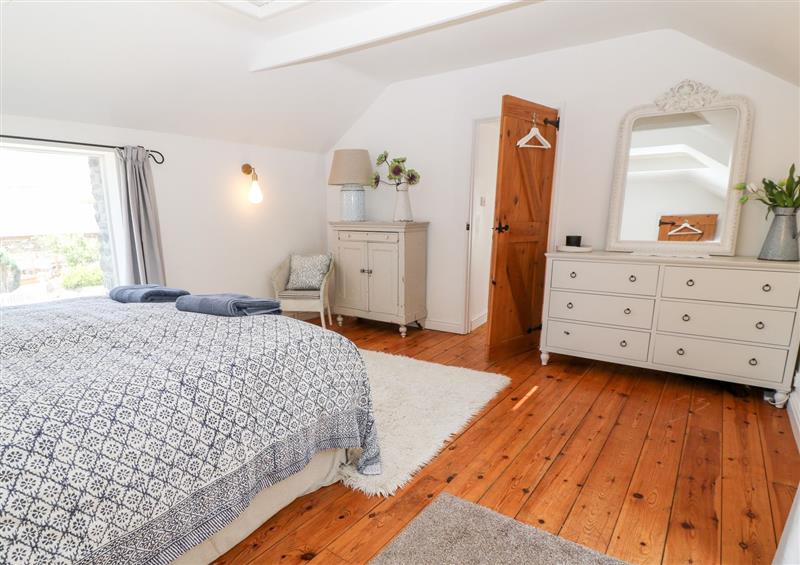 One of the bedrooms at The Old Stables, Watergate Bay