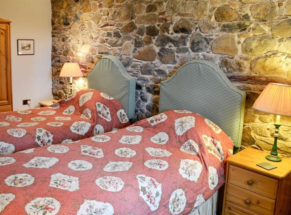 Twin bedroom with character at The Old Stables  in Wigton, Cumbria