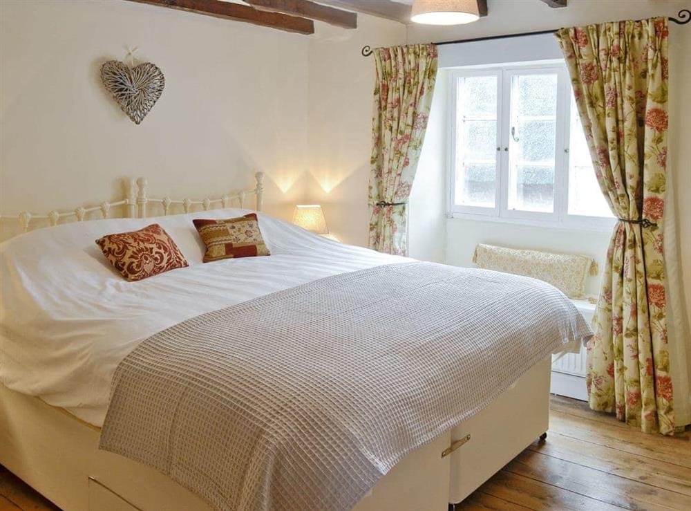 Master bedroom at The Old Sweet Shop in Hook Norton, near Chipping Norton, Oxfordshire