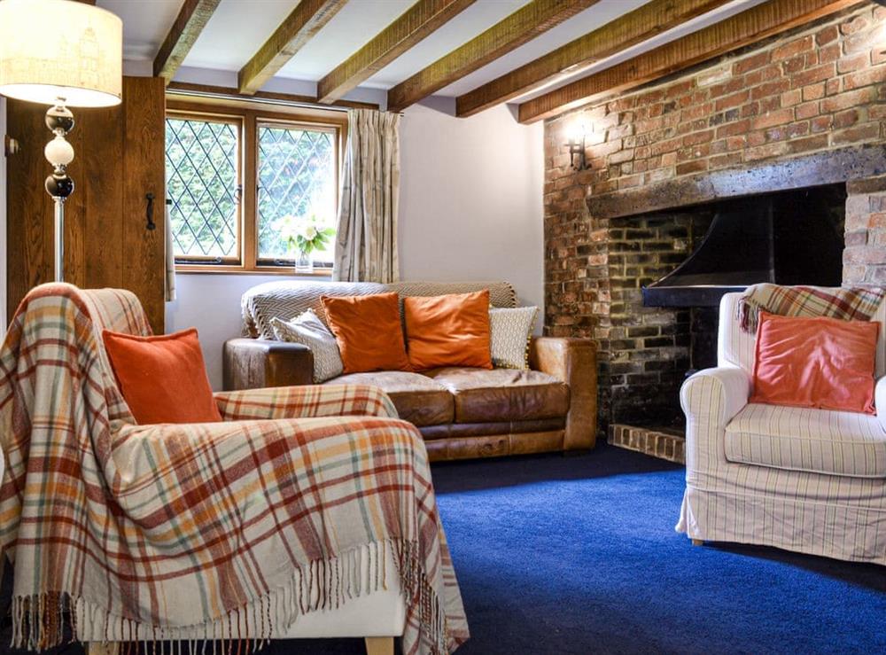 Living room at The Old Thatched Cottage in St Michaels, near Tenterden, Kent