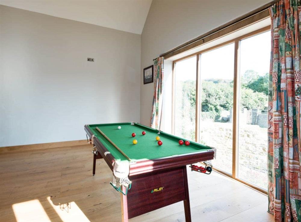 Games room at The Old Tithe Barn in Litton Cheney, near Dorchester, Dorset