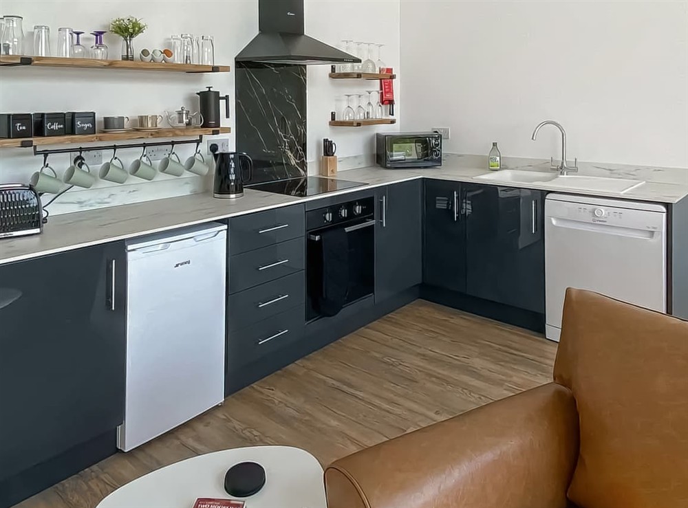 Open plan living space (photo 2) at The Old Tractor Shed in Witheridge, Devon