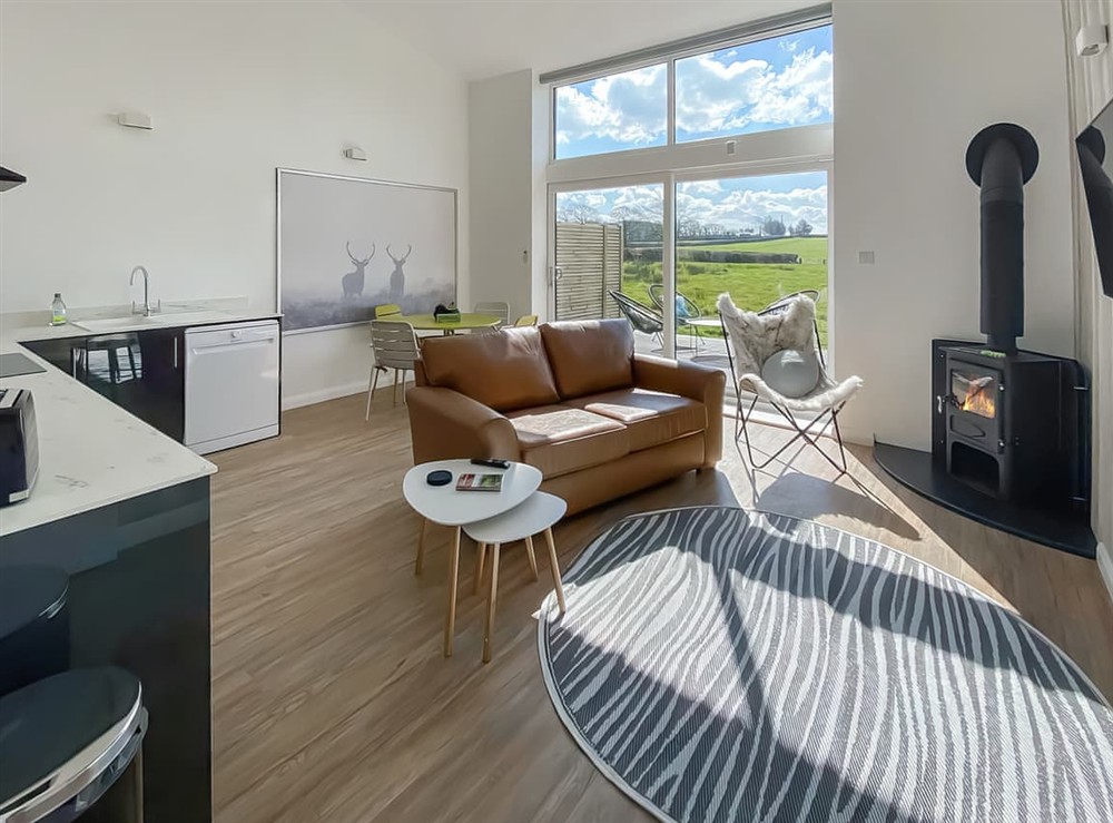 Open plan living space at The Old Tractor Shed in Witheridge, Devon