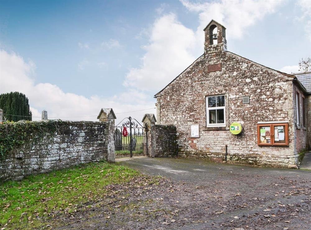 Village hall and church gates at The Old Vicarage in Westward, near Wigton, Cumbria