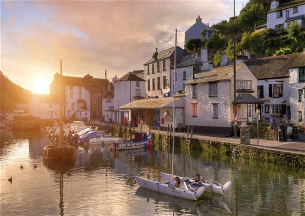 Polperro at sunset at The Old Wagon House in Downderry