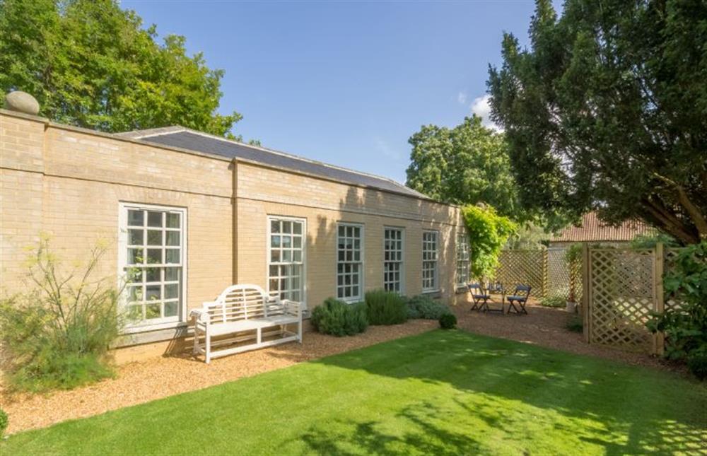 Garden:  mainly laid to lawn with  gravel borders at The Orangery, Snettisham near Kings Lynn