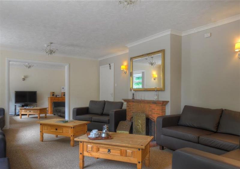 Relax in the living area at The Orchard Country House, Lyme Regis