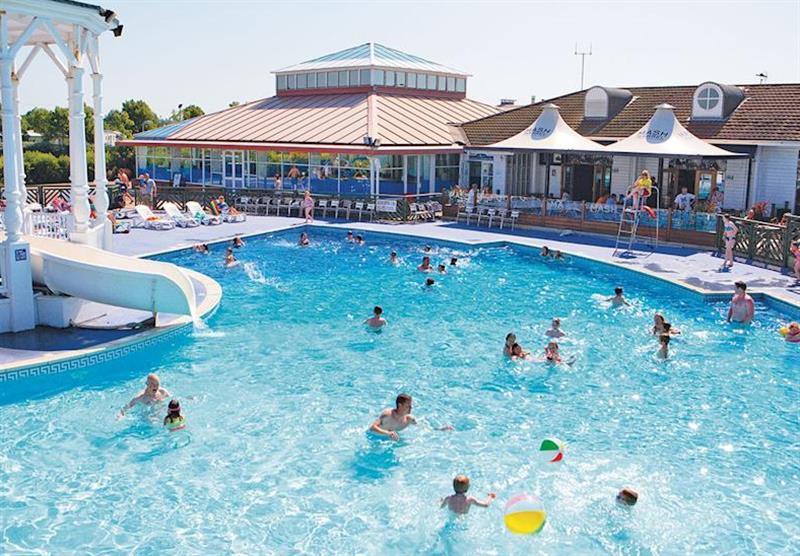 Outdoor heated pool at The Orchards Holiday Village in St Osyth, Clacton-on-Sea