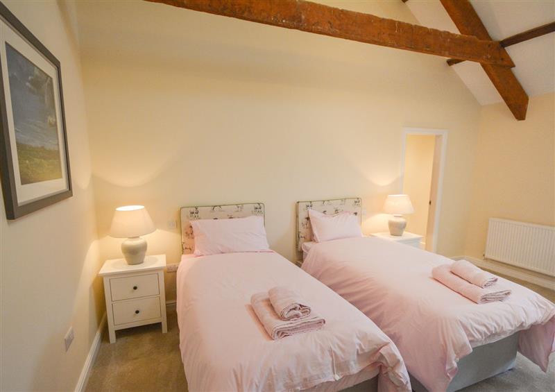 This is a bedroom (photo 4) at The Outbuildings, Llangaffo