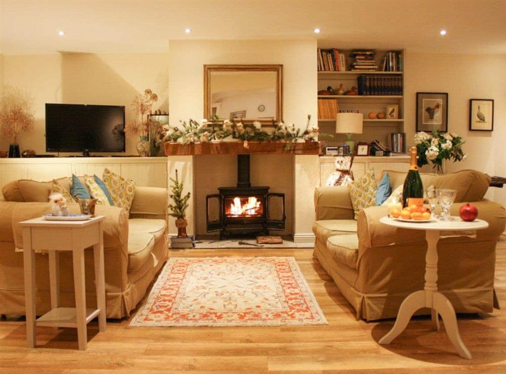 Cosy living room decorated for Christmas at The Owl House in Bishops Waltham, Hampshire
