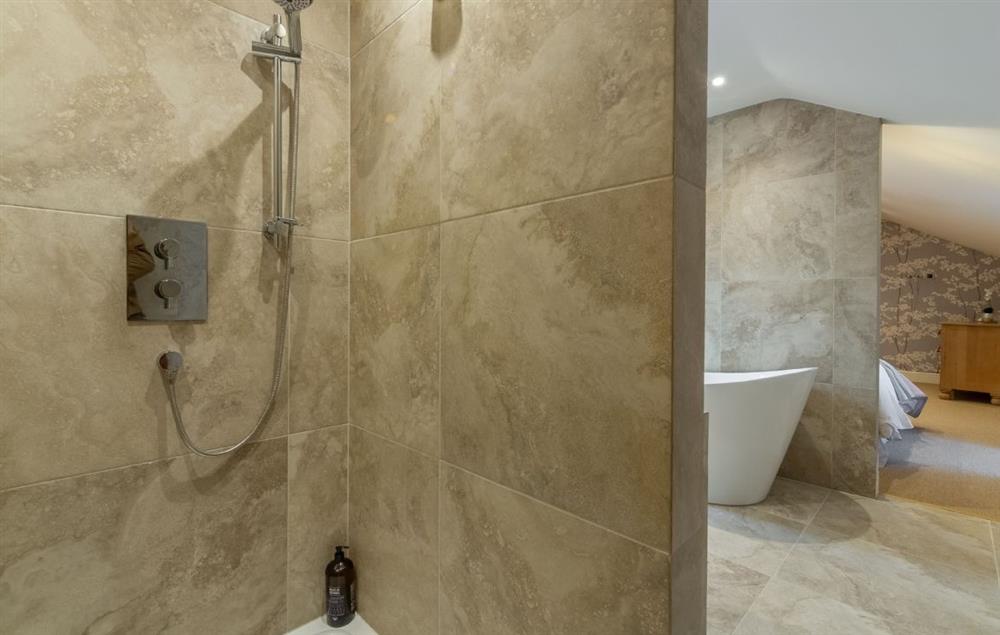 En-suite with slipper bath and walk-in shower