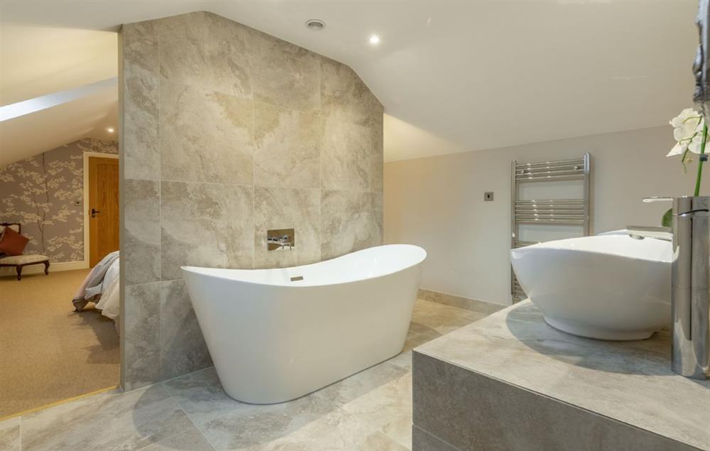 En-suite with slipper bath and walk-in shower at The Owl House, Little Massingham