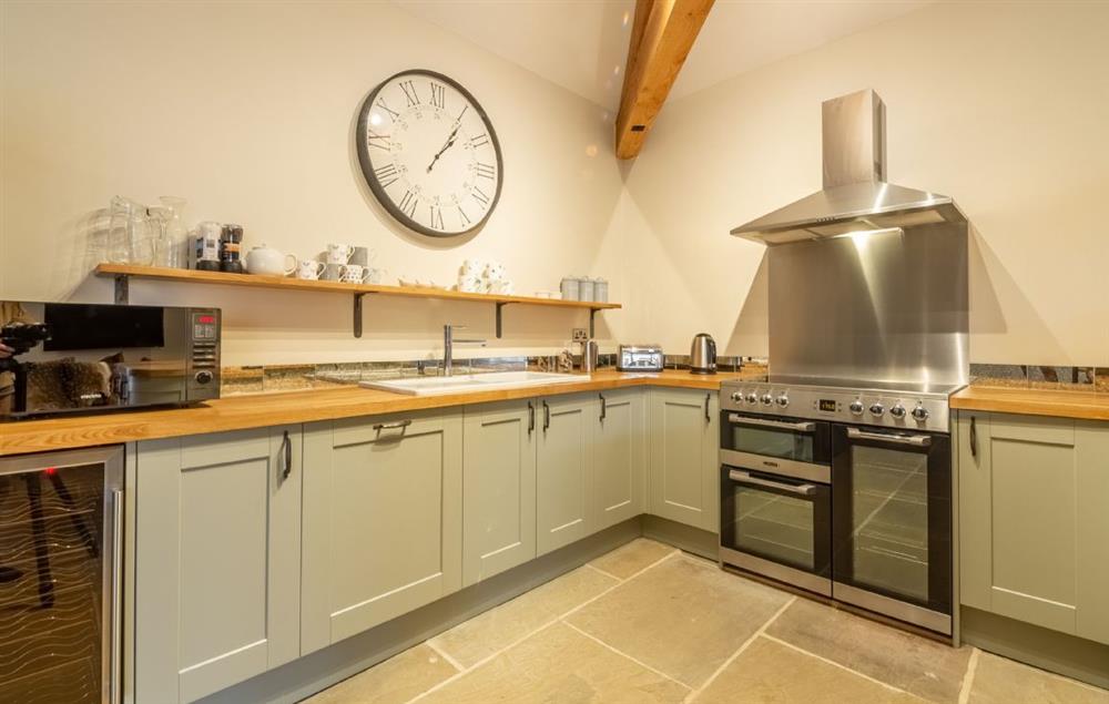 Open plan fully equipped kitchen (photo 2) at The Owl House, Little Massingham