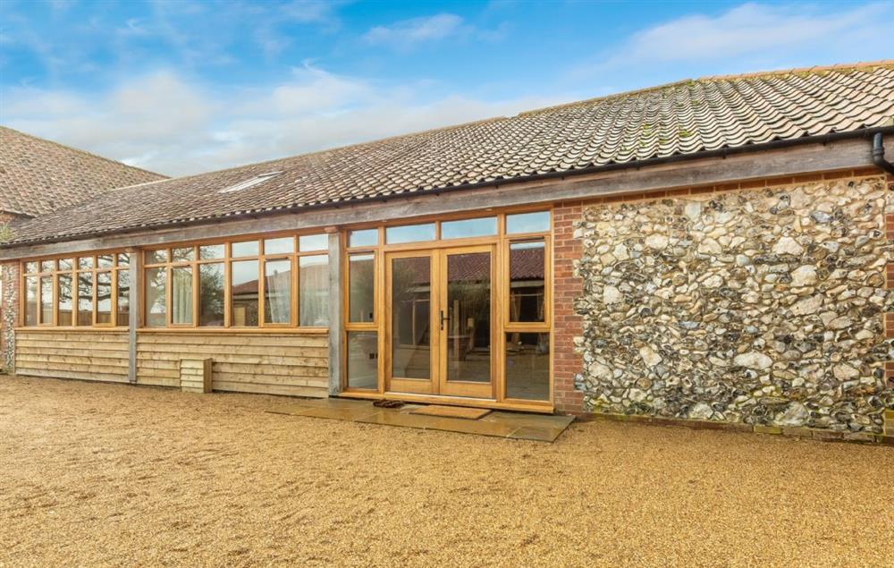 The Owl House is a beautiful brick and flint barn in the heart of rural paradise